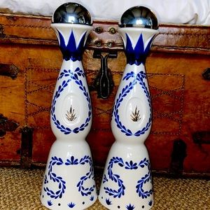 Two authentic Clase Azul Reposado tequila bottles.
